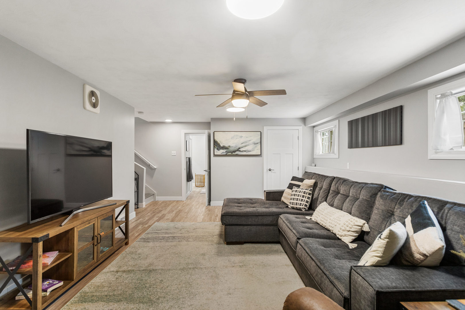 706 Madison Street Monticello, IL 61856 - Photo 13 of 38 a living room with furniture and a flat screen tv