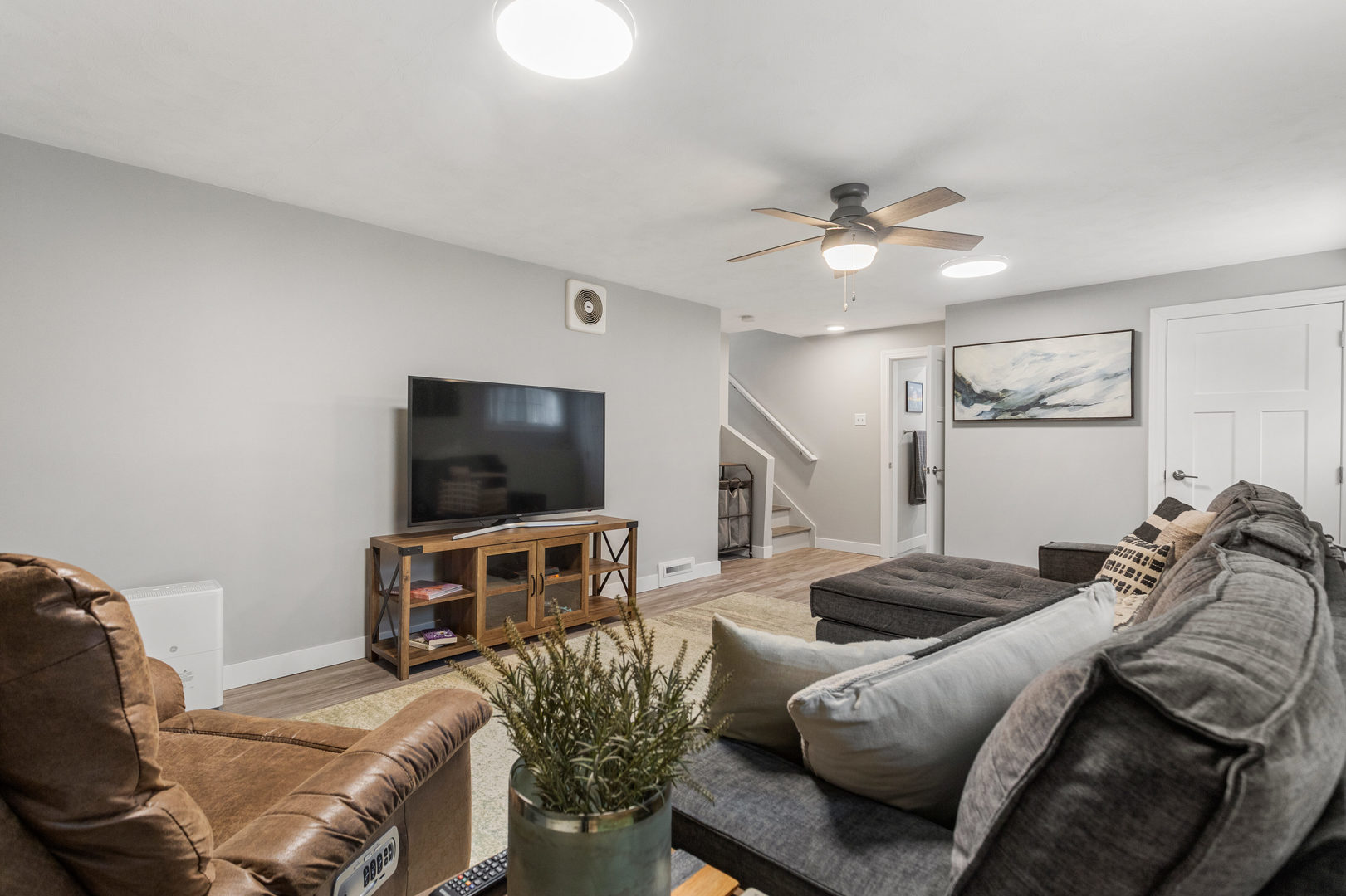 706 Madison Street Monticello, IL 61856 - Photo 14 of 38 a living room with furniture and a flat screen tv