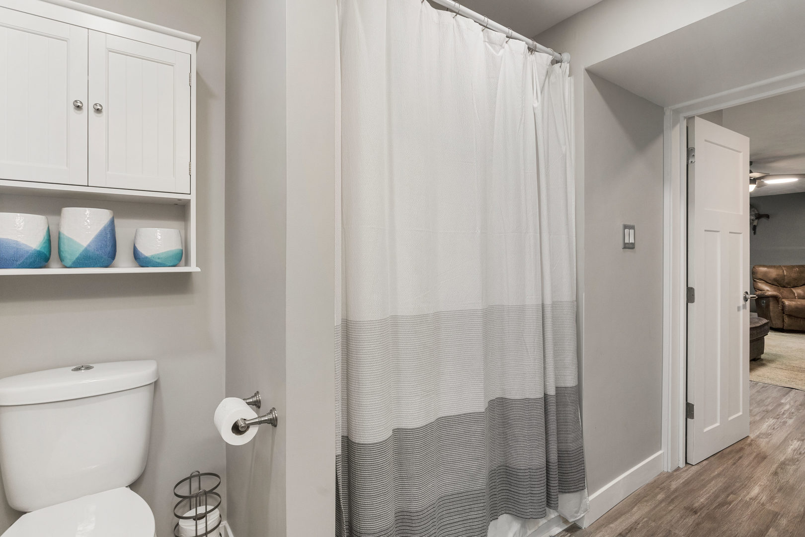 706 Madison Street Monticello, IL 61856 - Photo 16 of 38 a bathroom with a toilet and a shower