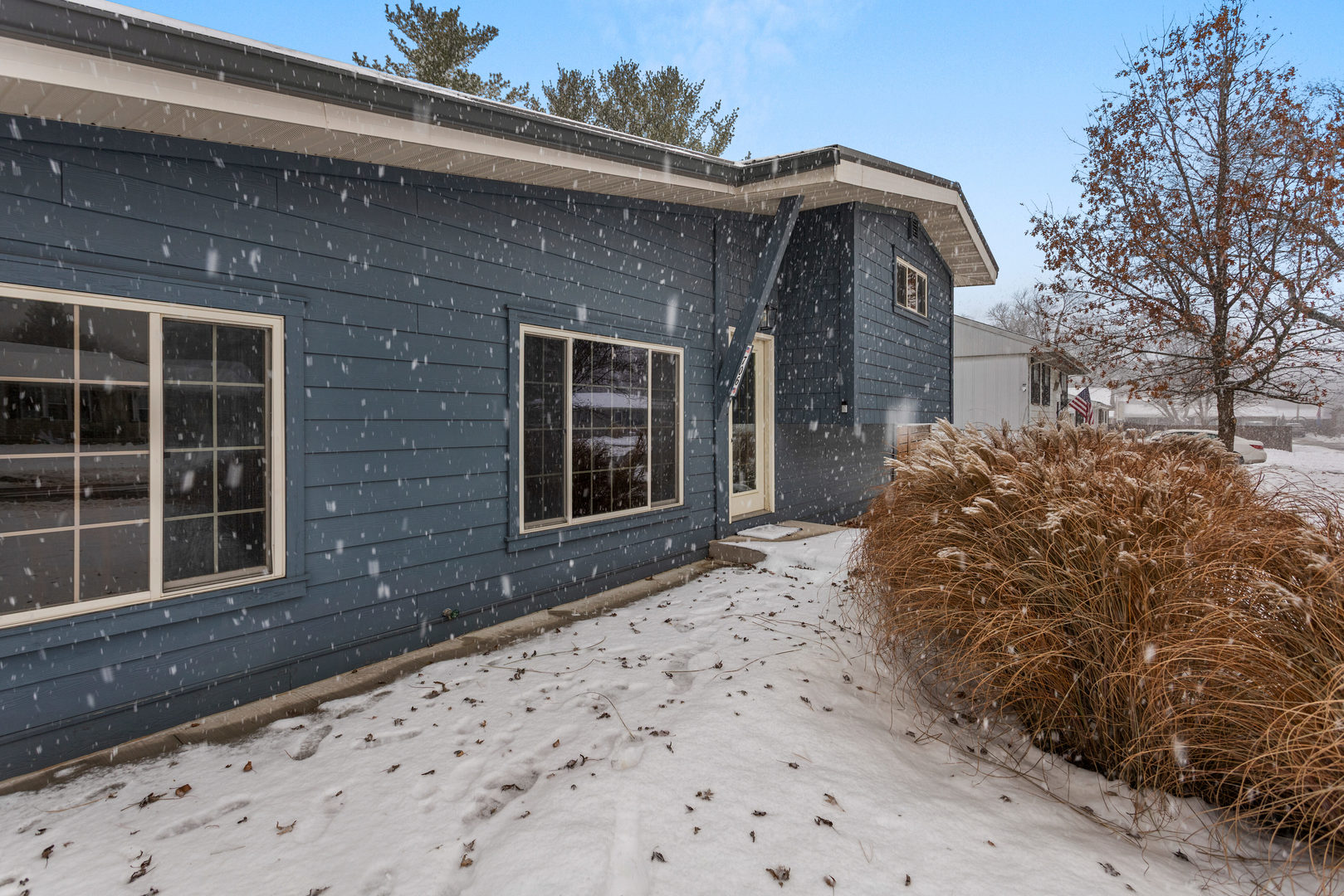 706 Madison Street Monticello, IL 61856 - Photo 2 of 38 a front view of a house with a yard