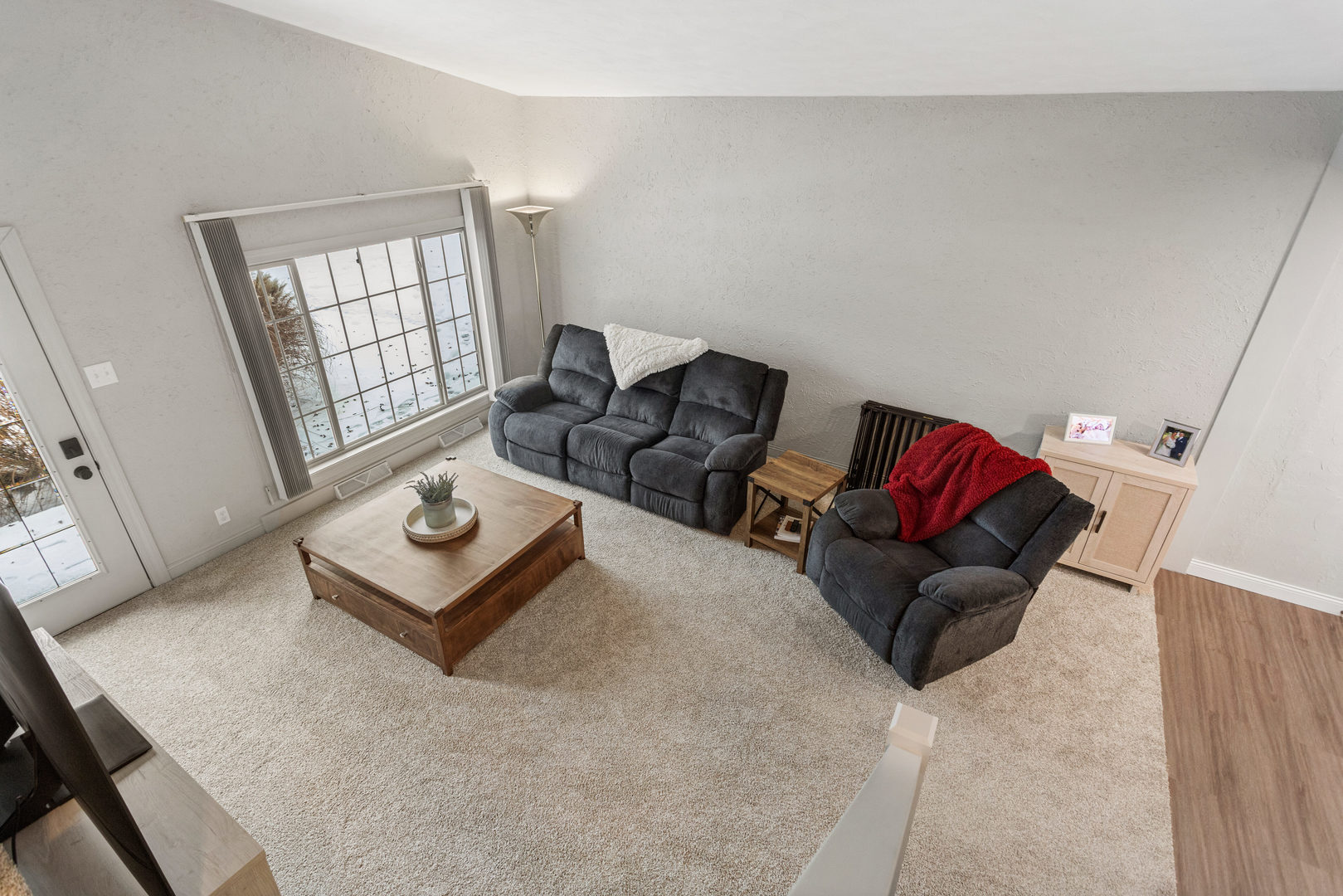 706 Madison Street Monticello, IL 61856 - Photo 22 of 38 a living room with furniture rug and window
