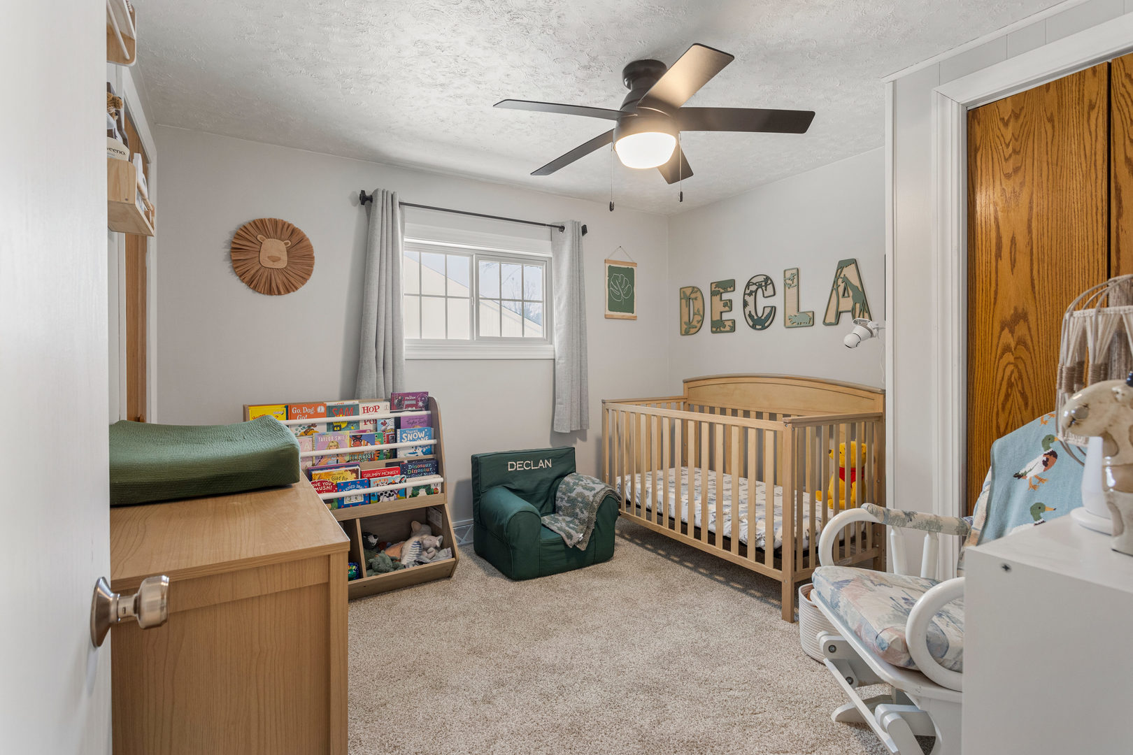 706 Madison Street Monticello, IL 61856 - Photo 27 of 38 a bedroom with furniture and a window