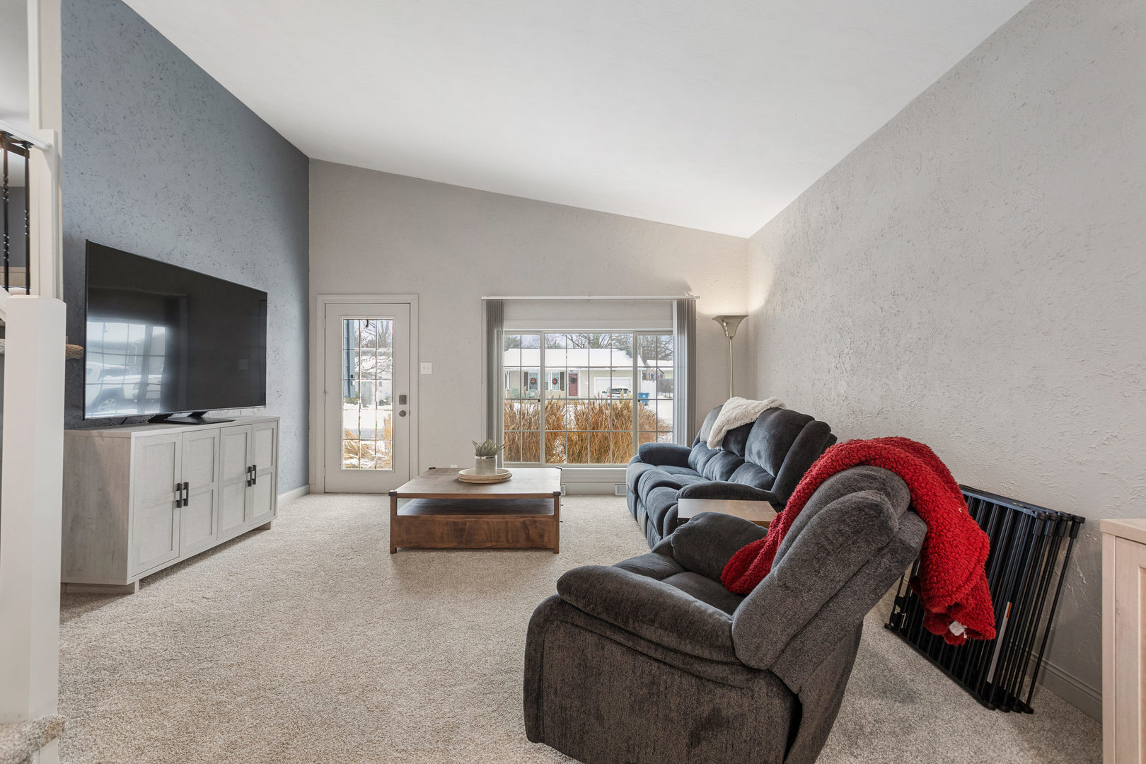 706 Madison Street Monticello, IL 61856 - Photo 4 of 38 a living room with furniture and a flat screen tv