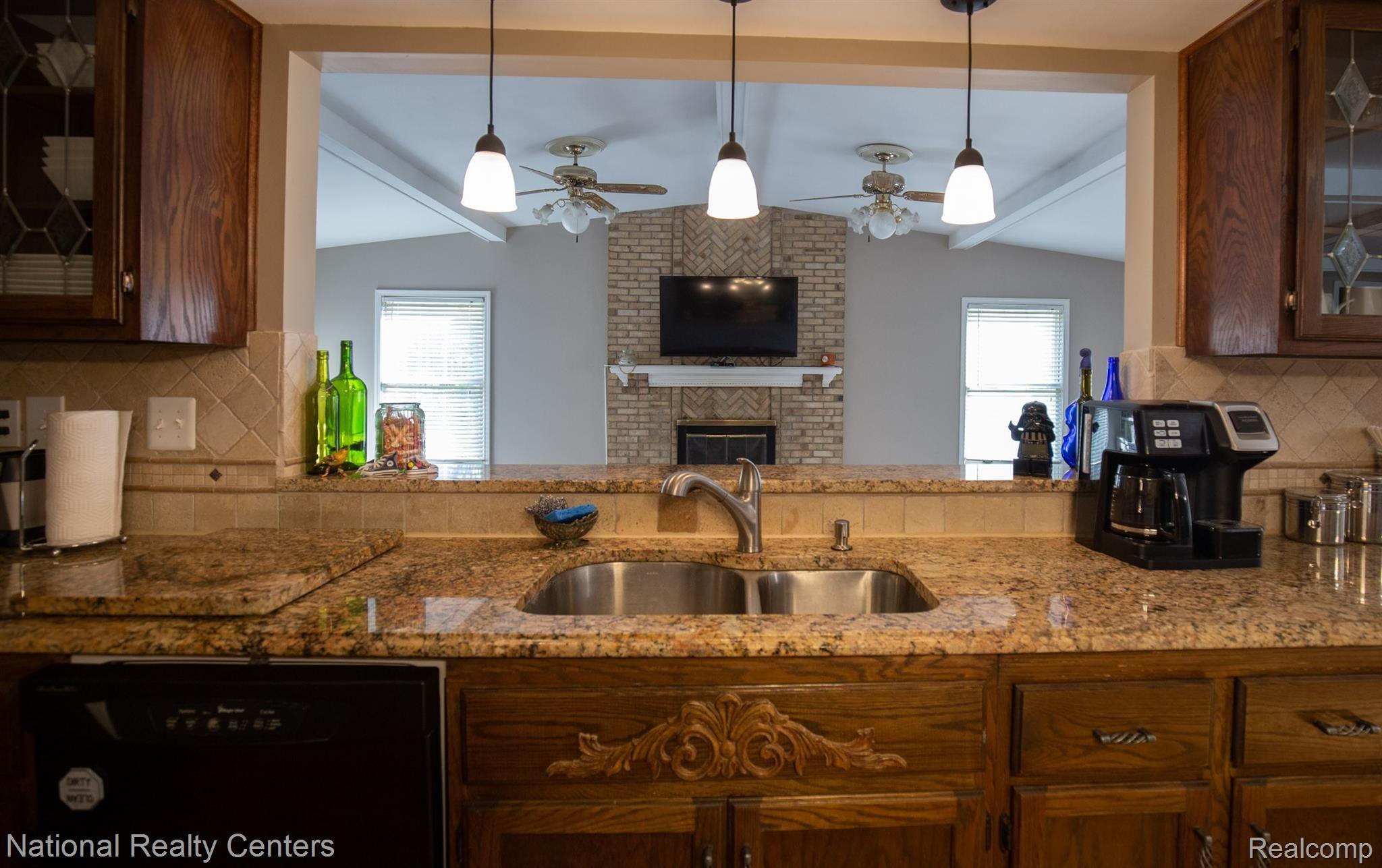 3035 Quail Ridge Circle Rochester, MI 48309 - Photo 13 of 54 Kitchen view to family room