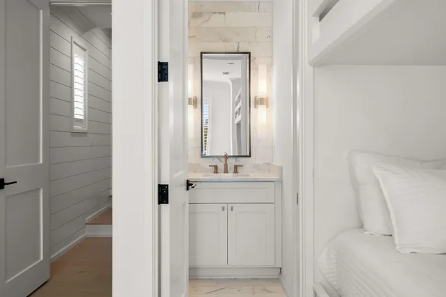 a view of kitchen with a sink and large window