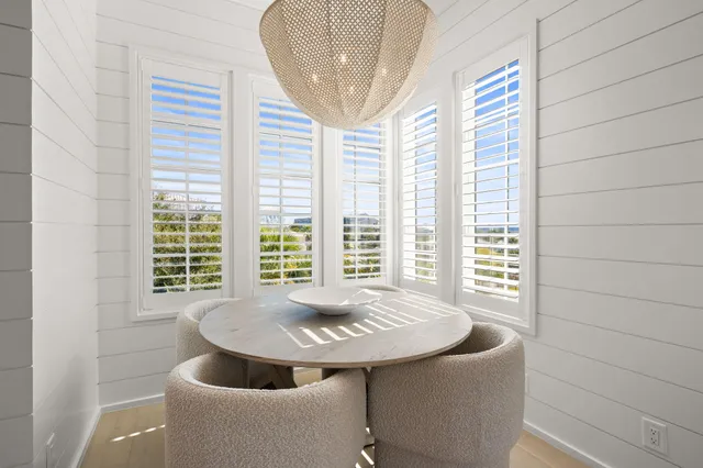 a bedroom with a bed and flat screen tv