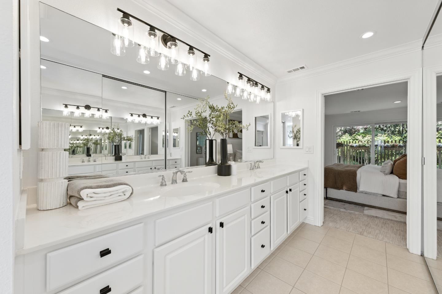 1 Los Altos Square Los Altos, CA 94022 - Photo 15 of 29 a spacious en suite bathroom with double sink and a large mirror