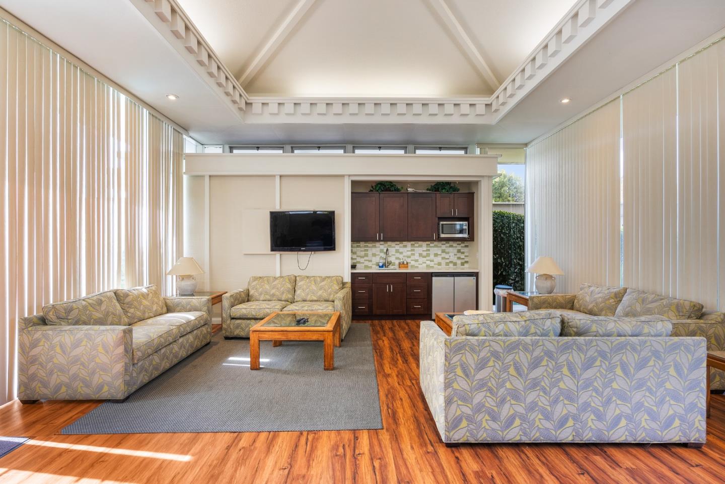 1 Los Altos Square Los Altos, CA 94022 - Photo 26 of 29 a living room with furniture and a fireplace