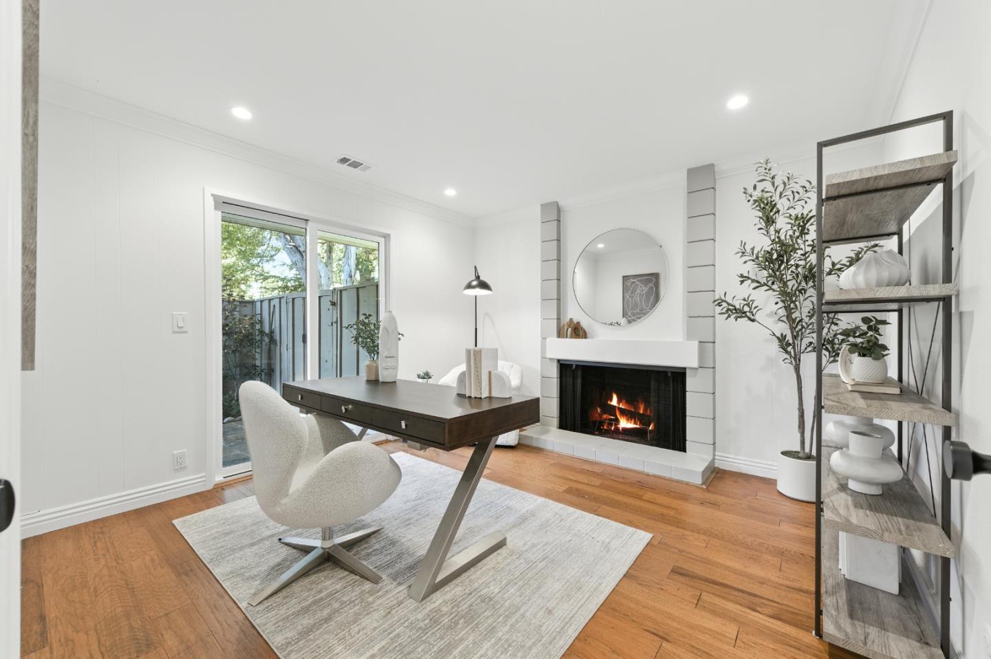 1 Los Altos Square Los Altos, CA 94022 - Photo 5 of 29 a living room with furniture and a fireplace