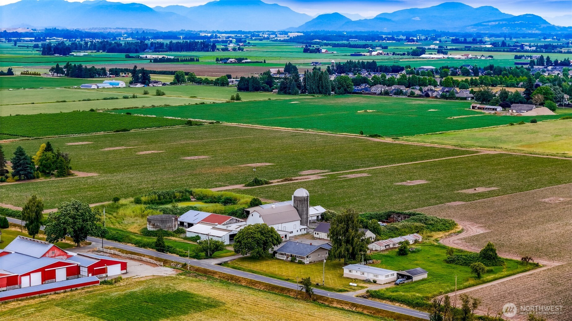 8634 Double Ditch Road Lynden, WA 98264 - Photo 29 of 40 a view of a field with houses