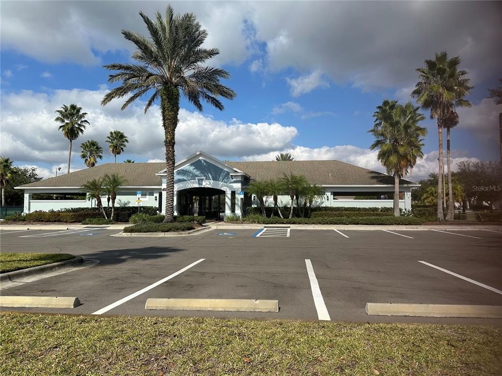 7739 Seafield Lane Wesley Chapel, FL 33545 - Photo 2 of 10 a view of a street with a building in the background