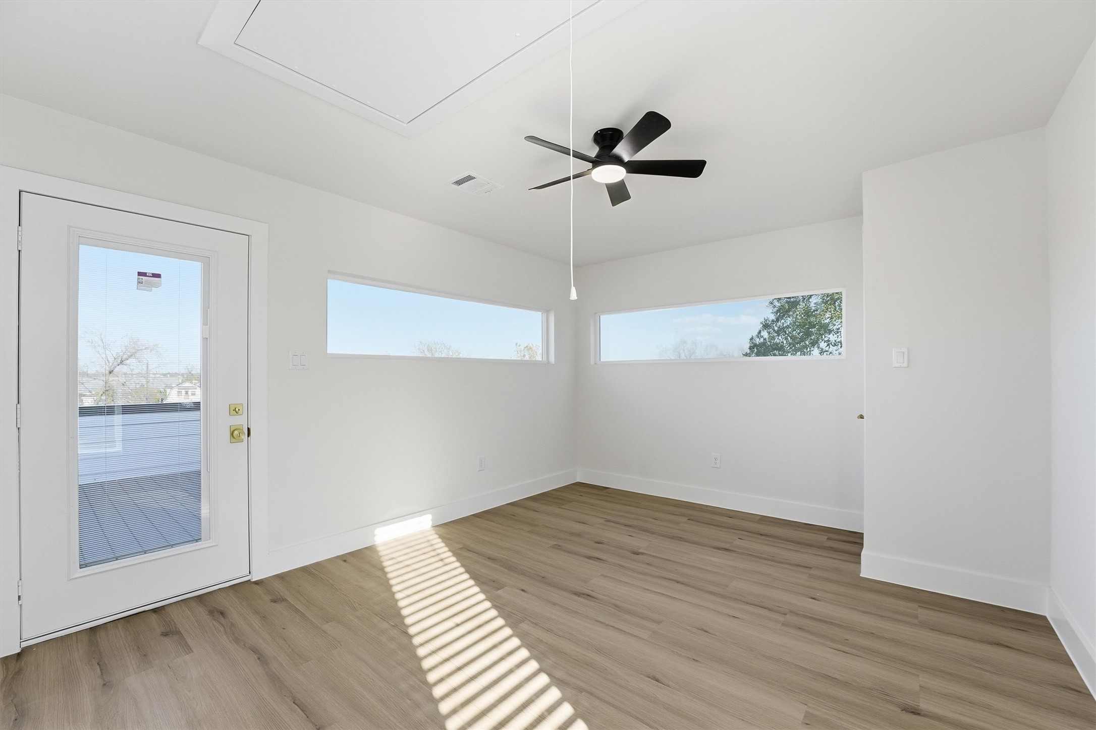 4208 Fox Street Houston, TX 77003 - Photo 26 of 43 a view of a room with wooden floor and carpet