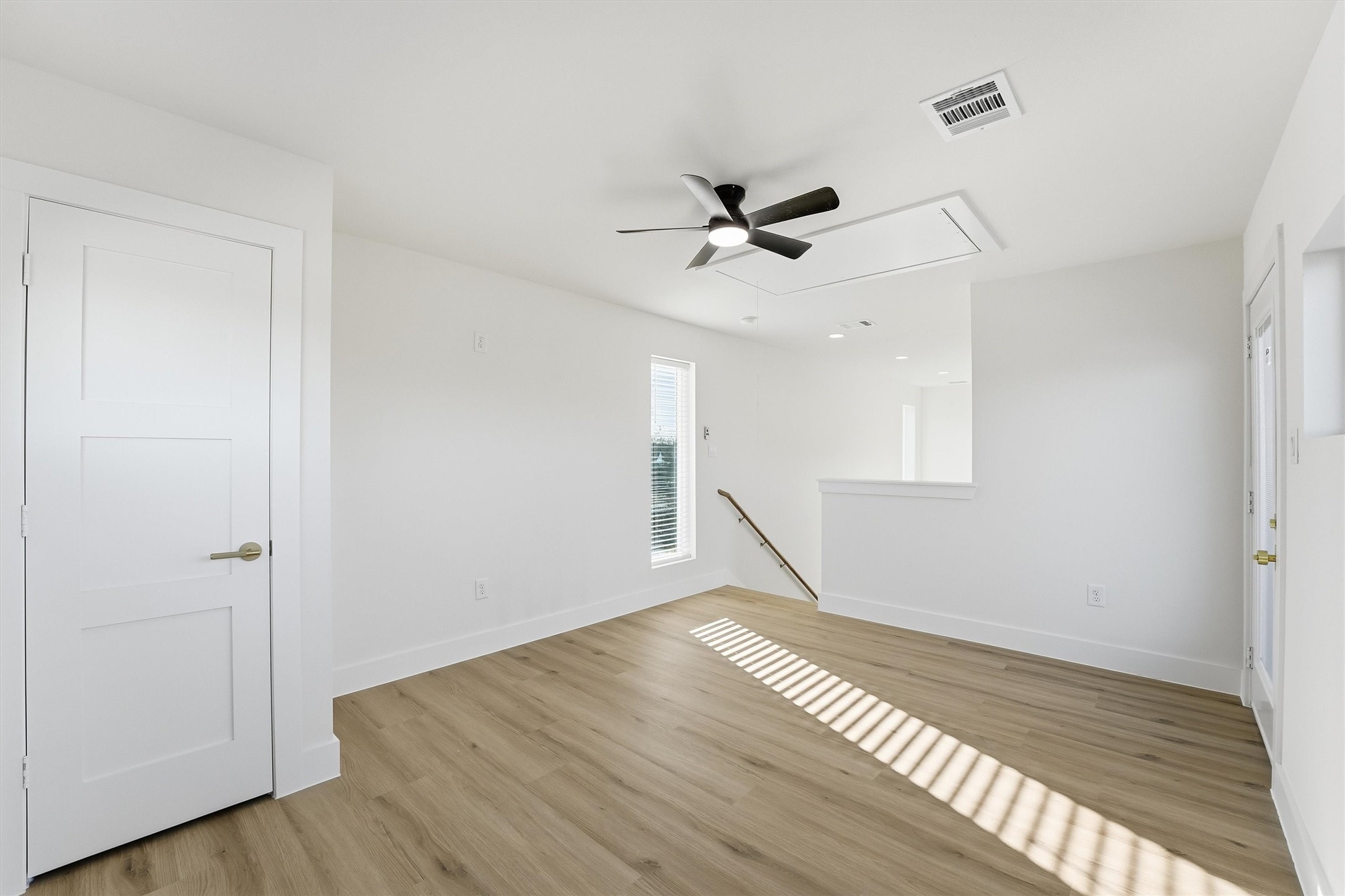 4208 Fox Street Houston, TX 77003 - Photo 28 of 43 a view of empty room with wooden floor and ceiling fan