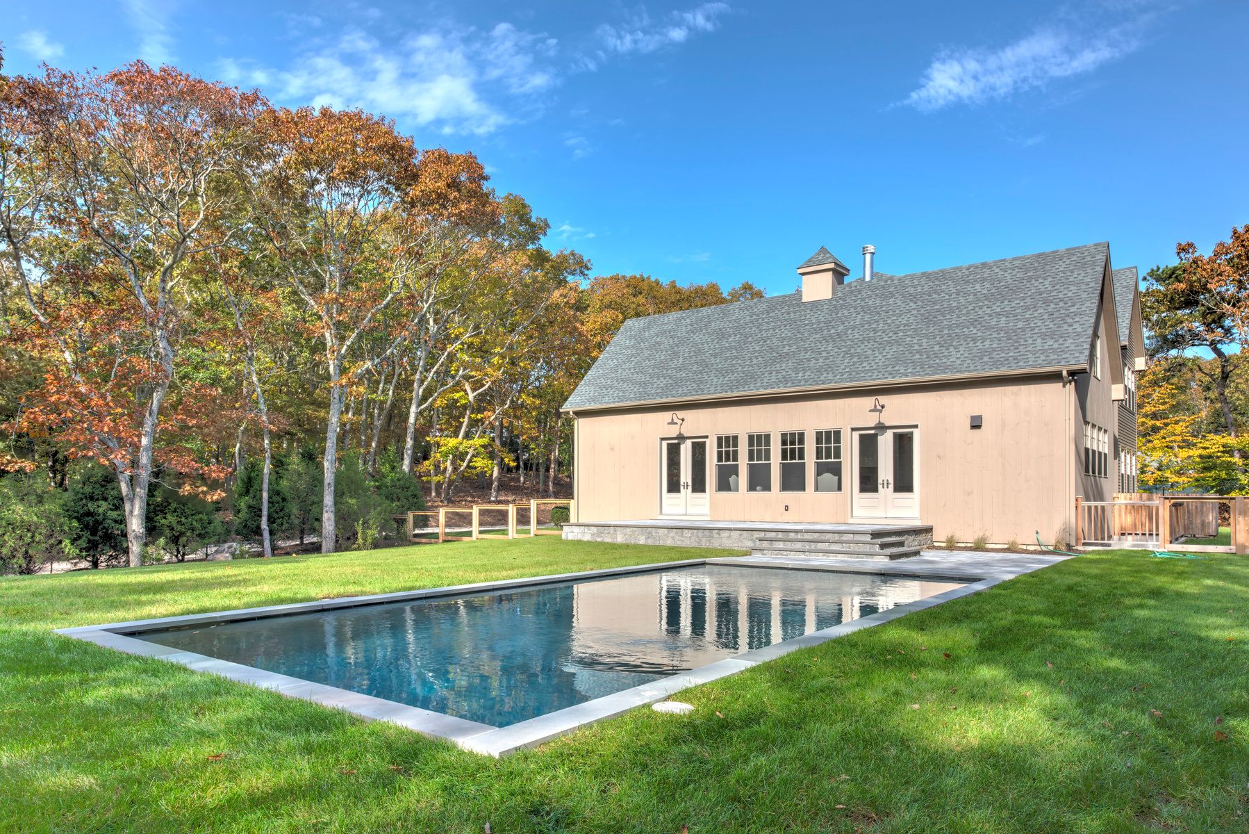 114 Three Mile Harbor Road East Hampton, NY 11937 - Photo 11 of 14 a view of a house with a backyard