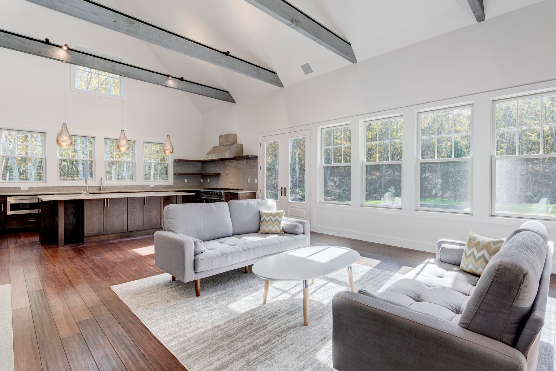 114 Three Mile Harbor Road East Hampton, NY 11937 - Photo 4 of 14 a living room with furniture and a large window