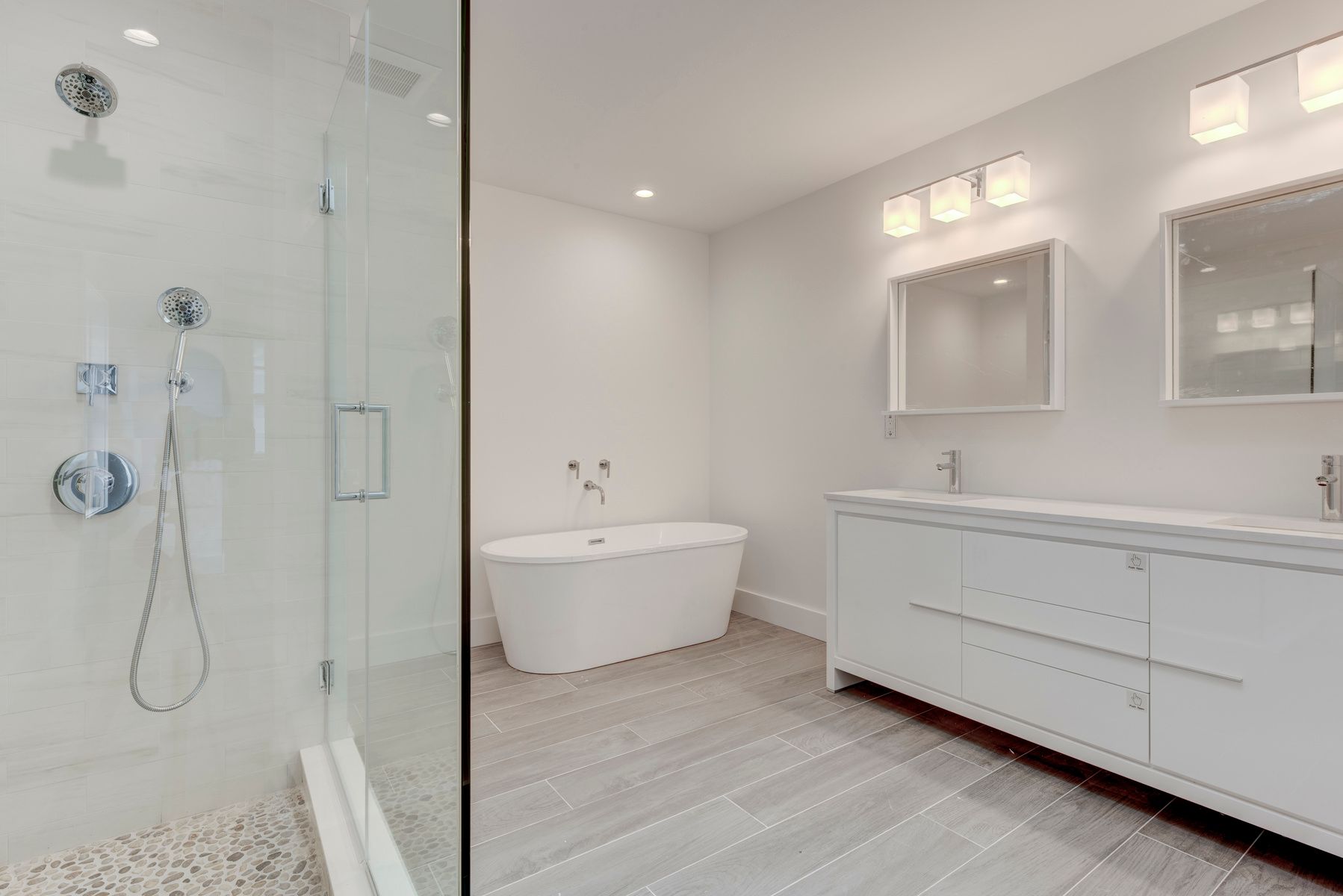 114 Three Mile Harbor Road East Hampton, NY 11937 - Photo 8 of 14 a bathroom with a bathtub and a shower