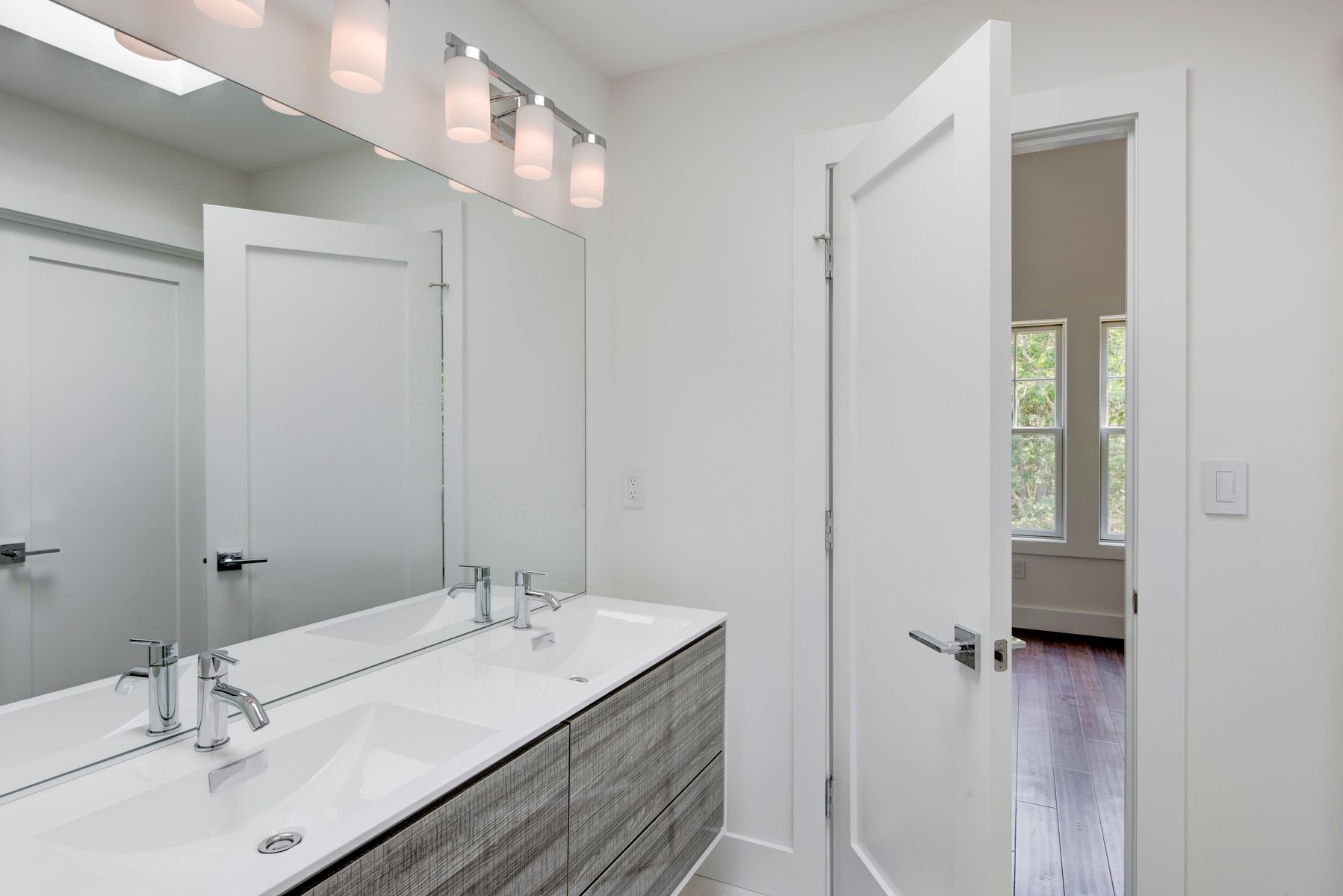 114 Three Mile Harbor Road East Hampton, NY 11937 - Photo 9 of 14 a bathroom with a granite countertop sink and a mirror