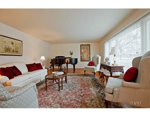 8220 Ridgepoint Drive Burr Ridge, IL 60527 - Photo 2 of 16 a living room with furniture and a large window