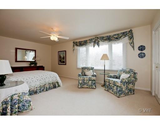 8220 Ridgepoint Drive Burr Ridge, IL 60527 - Photo 12 of 16 a living room with furniture and a large window
