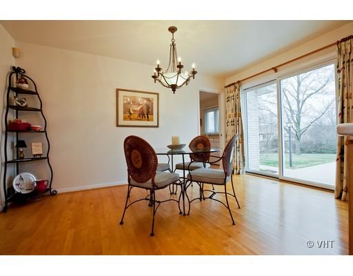 8220 Ridgepoint Drive Burr Ridge, IL 60527 - Photo 4 of 16 a view of a workspace with furniture and a window