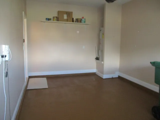 an empty room with a workbench