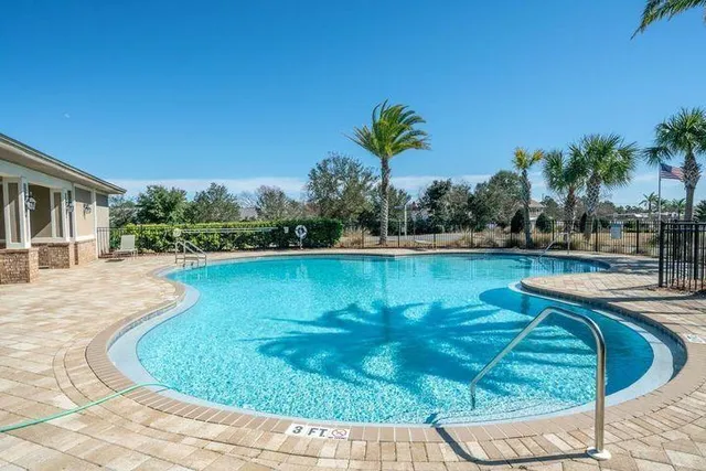 a view of a park with swings and slides