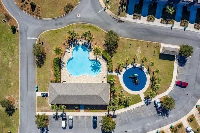 a view of a house with a swimming pool