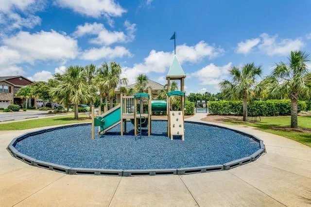a front view of a houses with yard