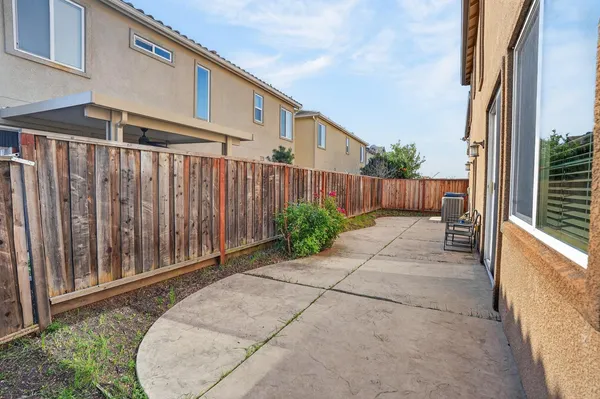 a view of a back yard of the house