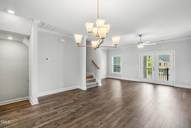 a view of a livingroom with wooden floor