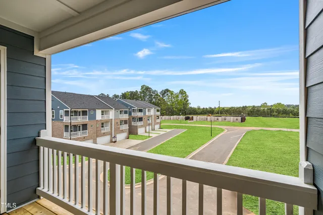 a view of a porch with a yard