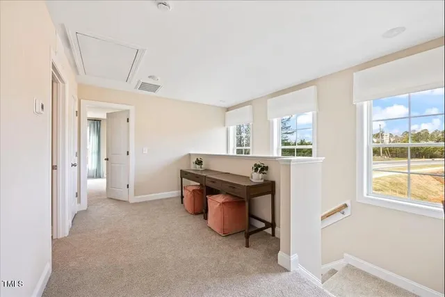 a bathroom with a shower sink and mirror