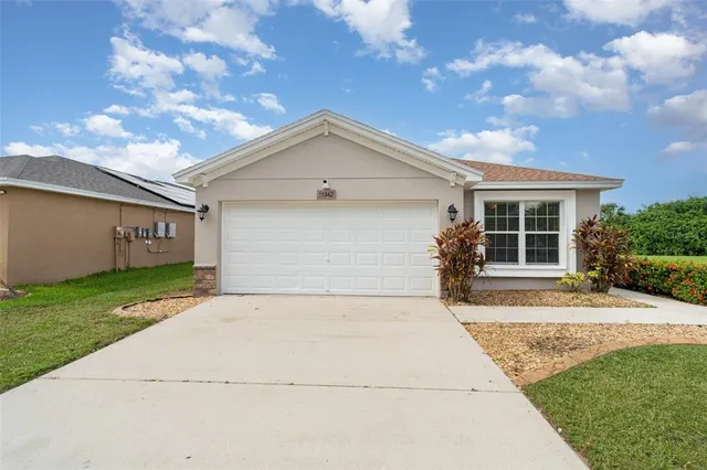 a front view of house with yard