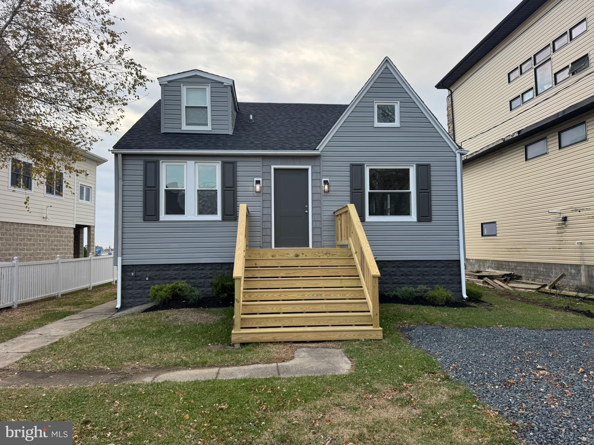 9135 Cuckold Point Road Sparrows Point, MD 21219 - Photo 1 of 53 a view of a house with a yard