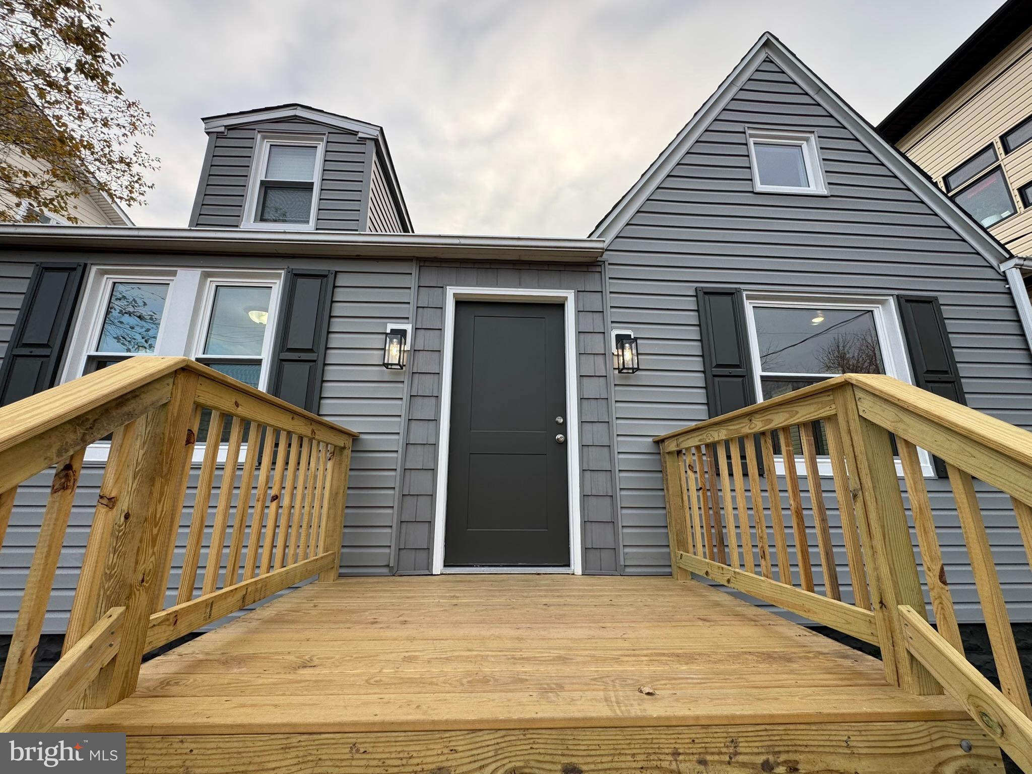 9135 Cuckold Point Road Sparrows Point, MD 21219 - Photo 15 of 53 a front view of a house with a balcony