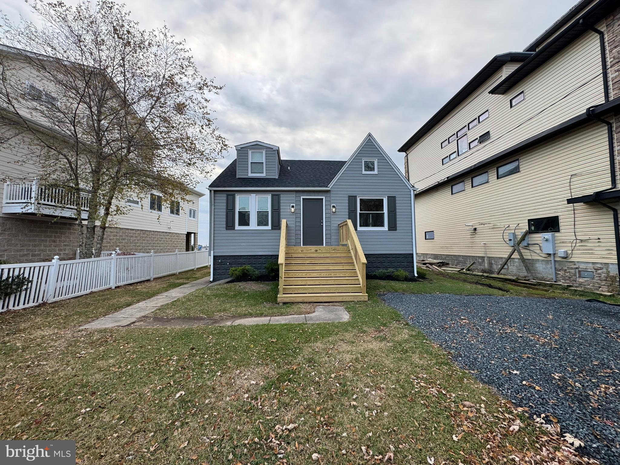 9135 Cuckold Point Road Sparrows Point, MD 21219 - Photo 2 of 53 a view of a house with a yard