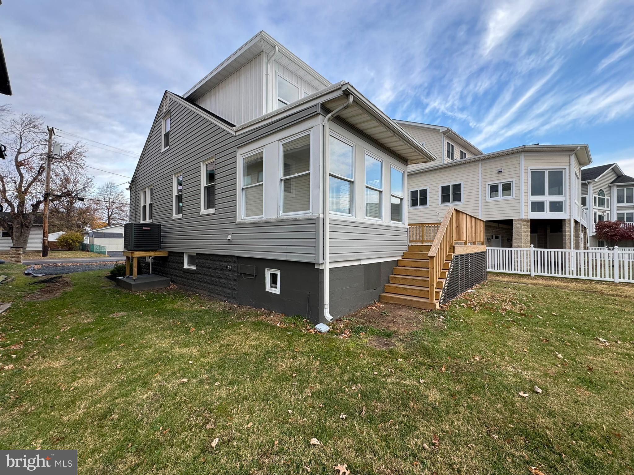 9135 Cuckold Point Road Sparrows Point, MD 21219 - Photo 4 of 53 a view of a house with a yard