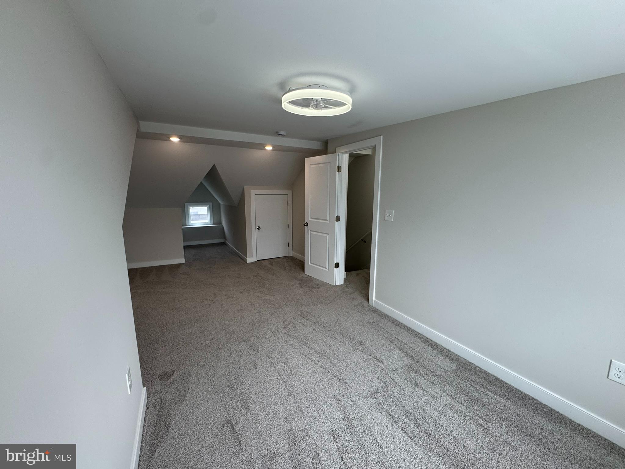 9135 Cuckold Point Road Sparrows Point, MD 21219 - Photo 44 of 53 an empty room with closet and mirror