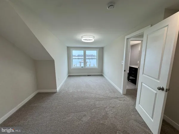 a view of a room that has a window