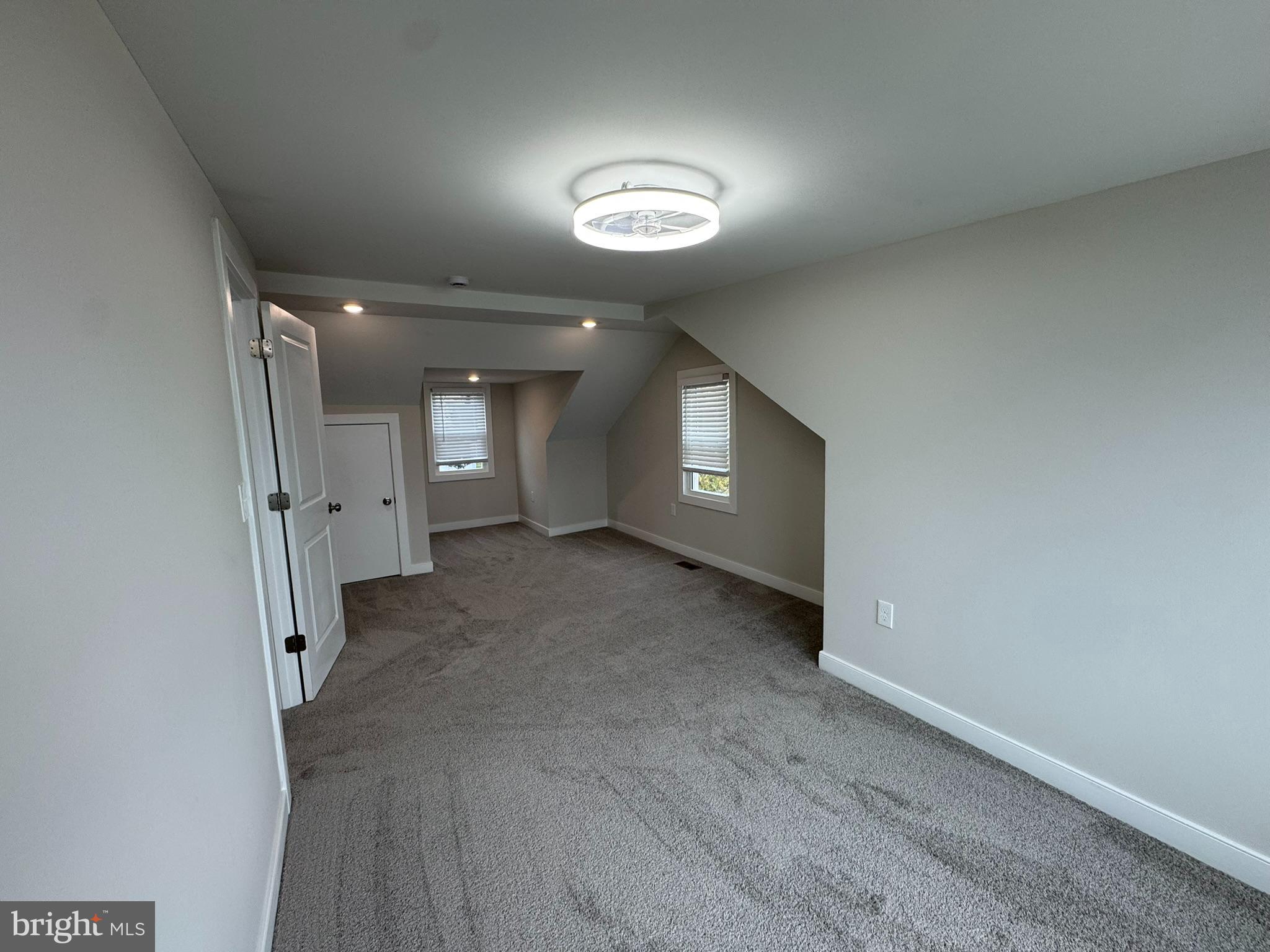 9135 Cuckold Point Road Sparrows Point, MD 21219 - Photo 51 of 53 a view of an empty room with a fireplace