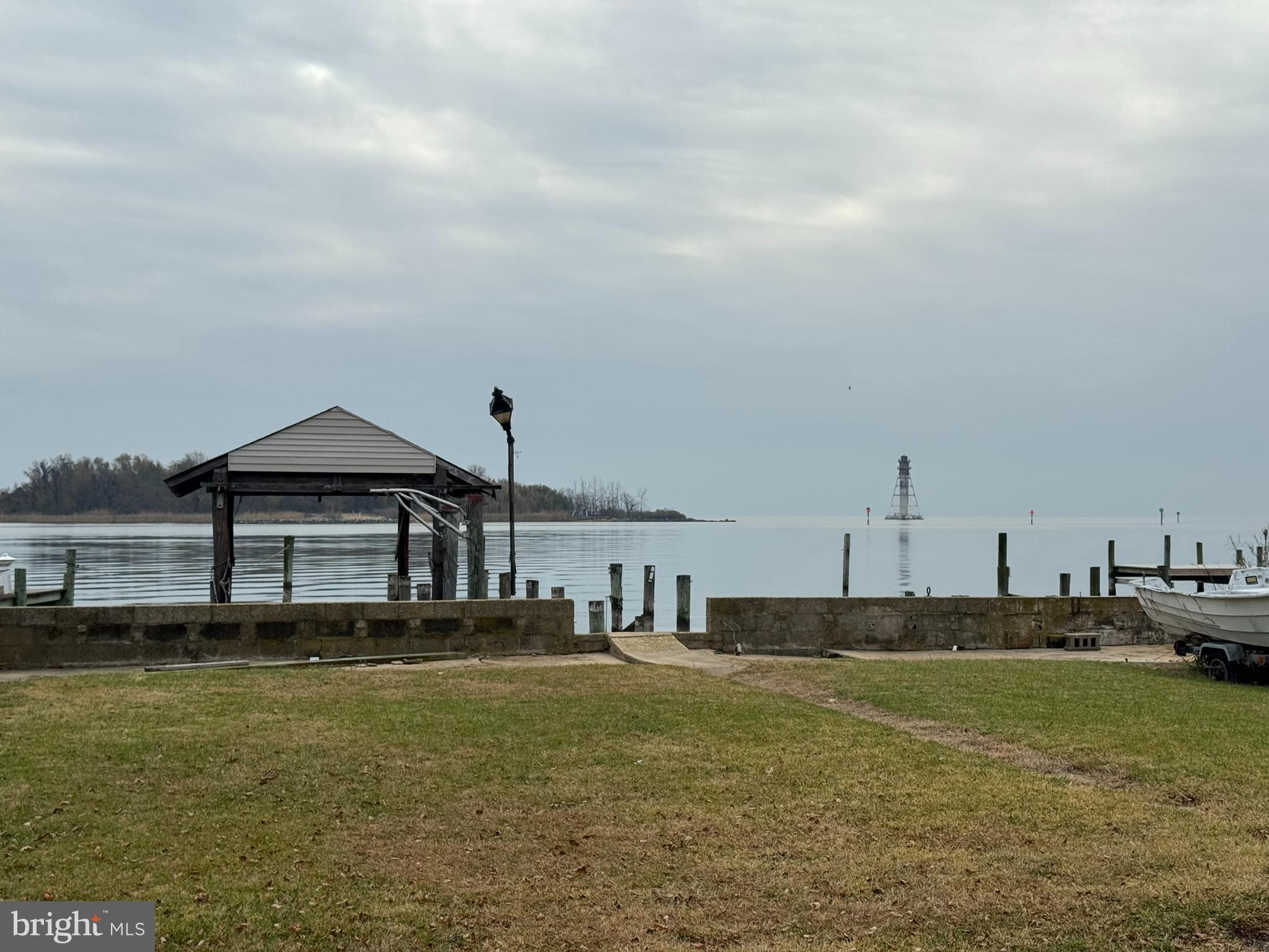 9135 Cuckold Point Road Sparrows Point, MD 21219 - Photo 53 of 53 a view of a lake with boats in the background
