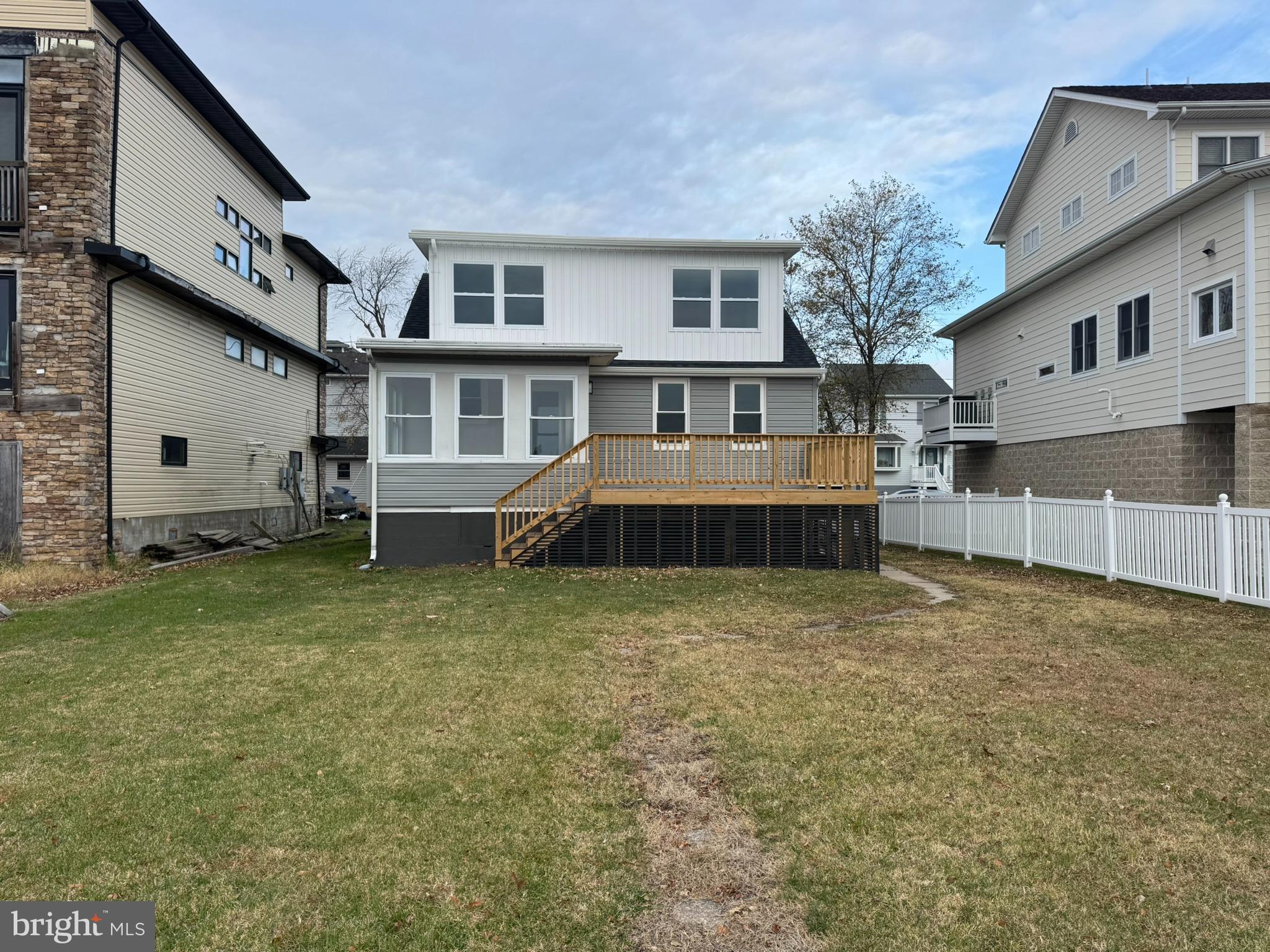 9135 Cuckold Point Road Sparrows Point, MD 21219 - Photo 9 of 53 a house view with a garden space