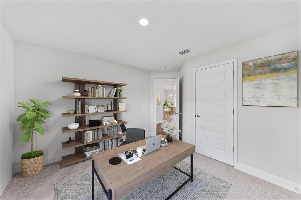 105 Dartmouth Road Venice, FL 34293 - Photo 32 of 100 a living room with furniture and a potted plant