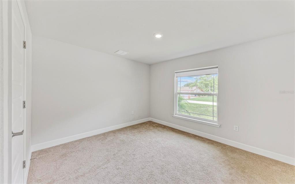 105 Dartmouth Road Venice, FL 34293 - Photo 38 of 100 an empty room with a window