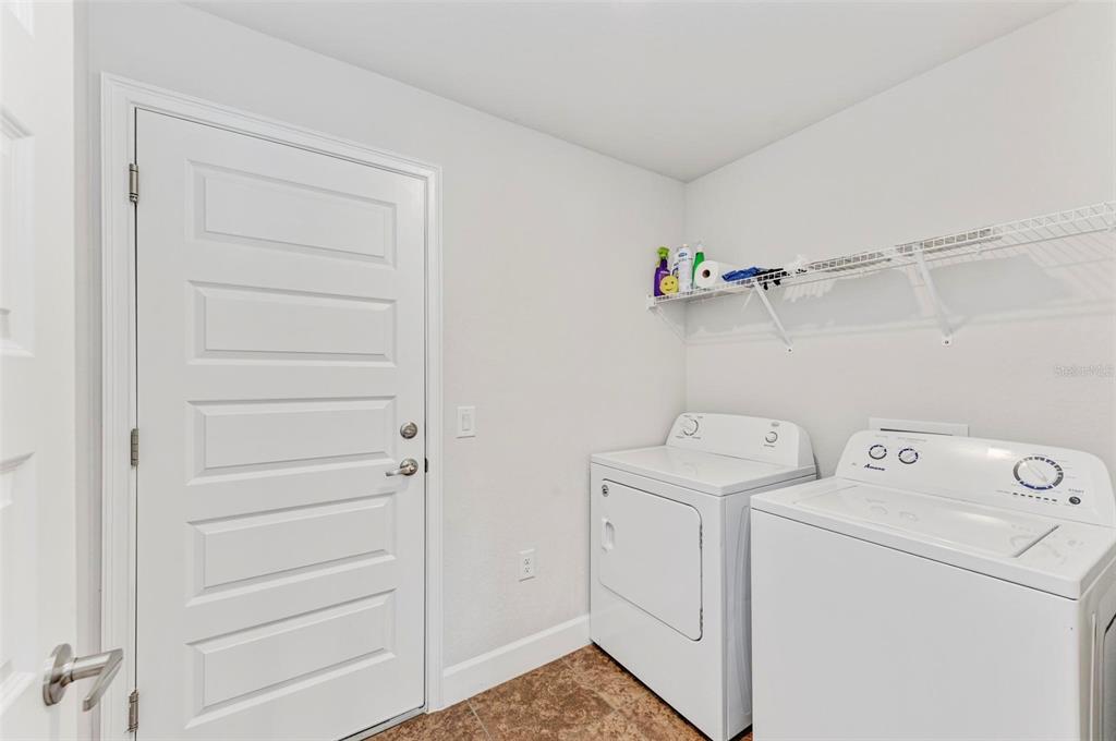 105 Dartmouth Road Venice, FL 34293 - Photo 39 of 100 a utility room with dryer and washer