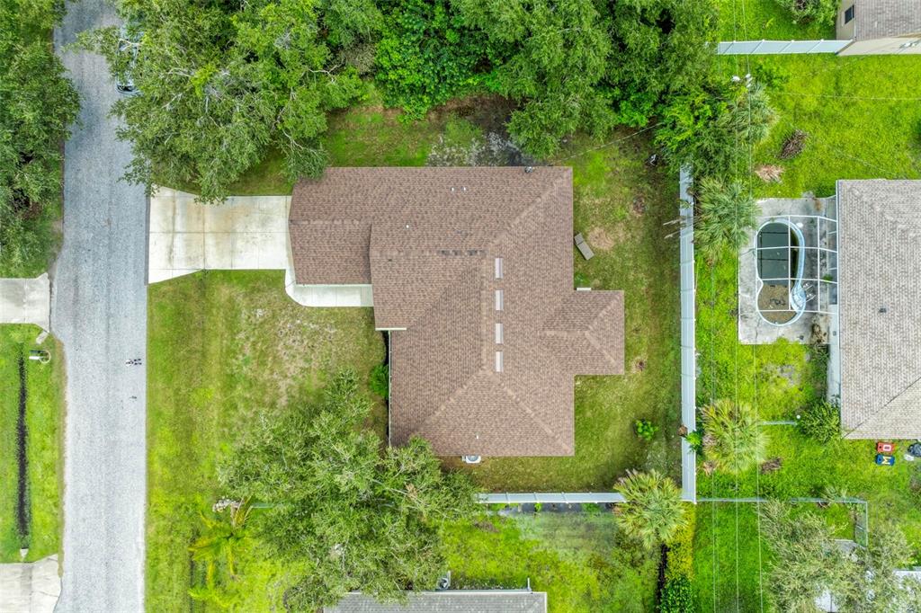 105 Dartmouth Road Venice, FL 34293 - Photo 44 of 100 an aerial view of a house with a yard