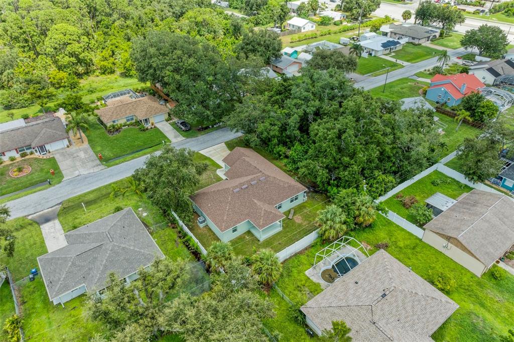 105 Dartmouth Road Venice, FL 34293 - Photo 51 of 100 an aerial view of a house with a garden
