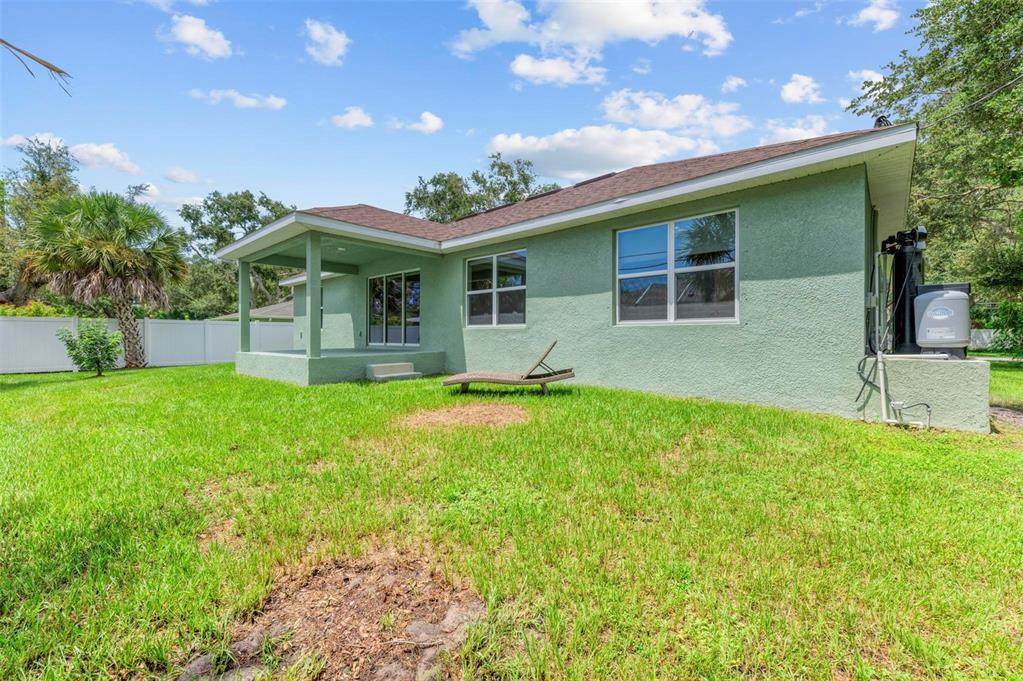 105 Dartmouth Road Venice, FL 34293 - Photo 58 of 100 a front view of house with yard and green space