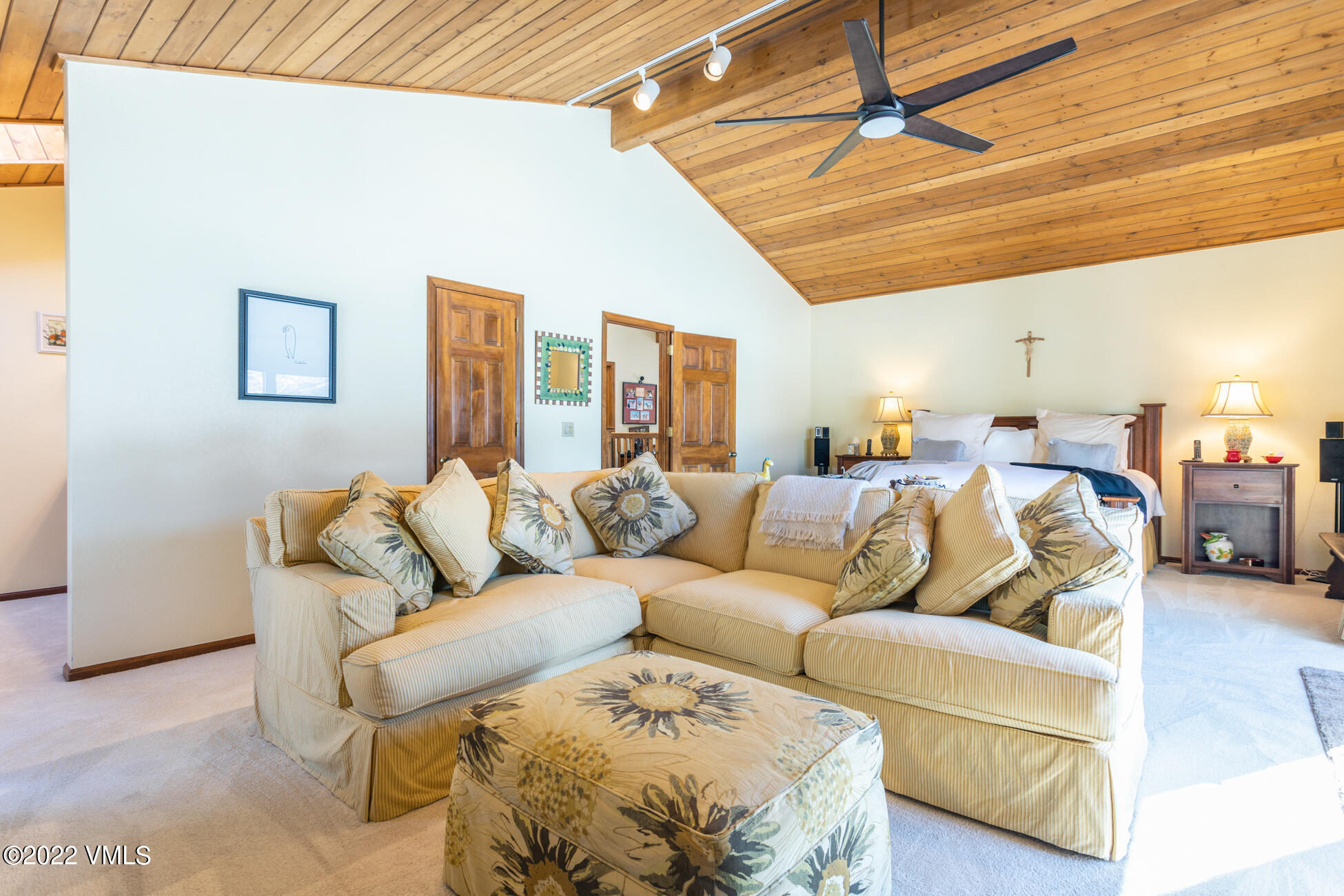 231 Rawhide Road Edwards, CO 81632 - Photo 17 of 35 a living room with furniture and a chandelier