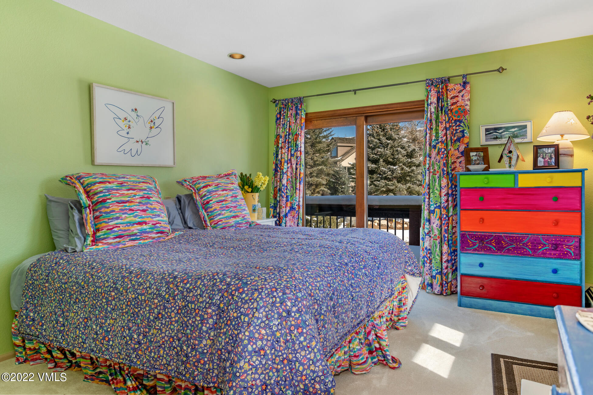 231 Rawhide Road Edwards, CO 81632 - Photo 24 of 35 a bedroom with a bed painting on wall and a large window